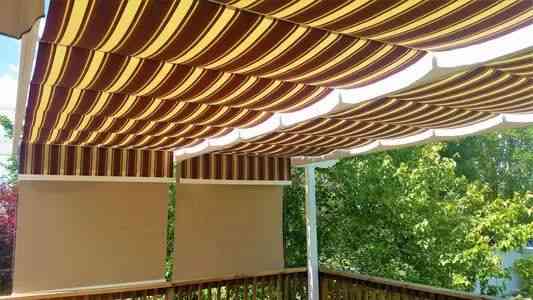 Striped canopies with added outdoor blinds